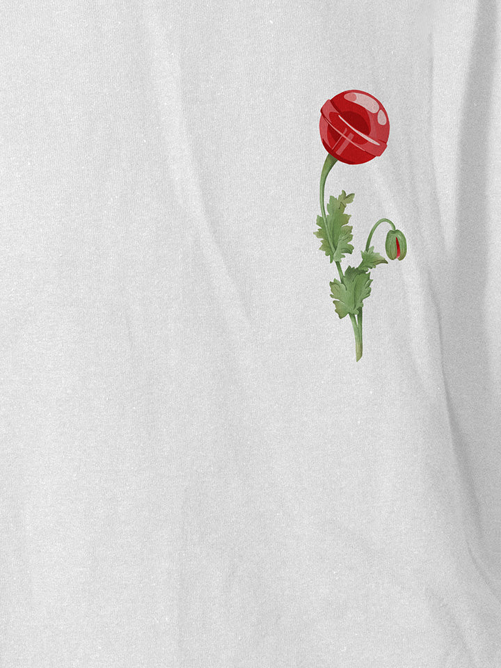 A close-up of a white printed t-shirt by useless treasures. Print of an illustrated red candy flower.