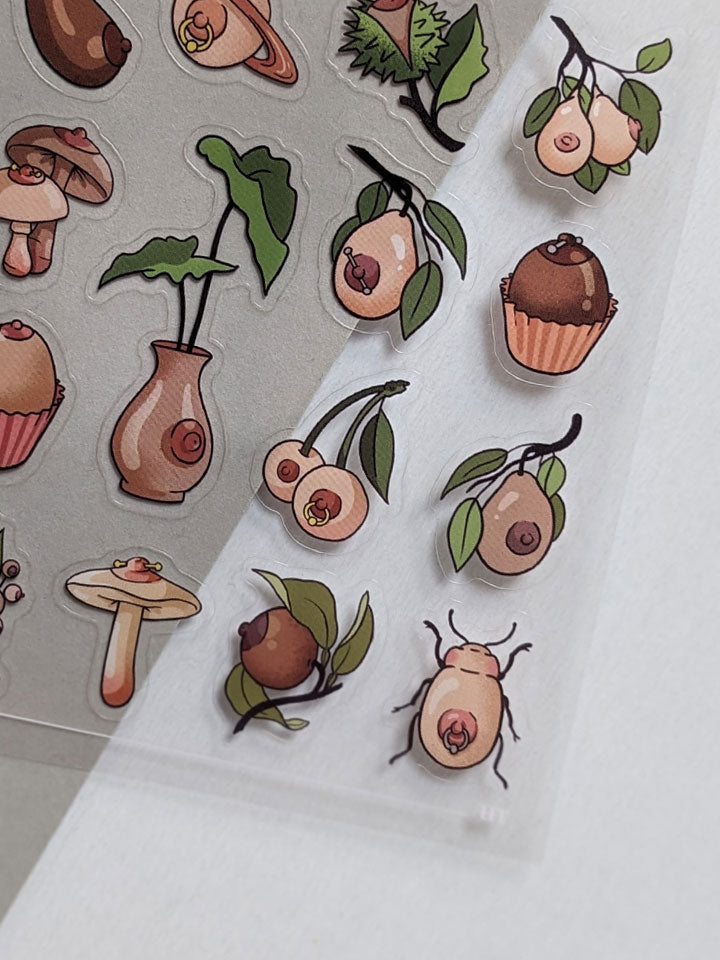 Original art sticker sheet, semi-transparent material. collection of surreal illustrations of different boobs by useless treasures. 