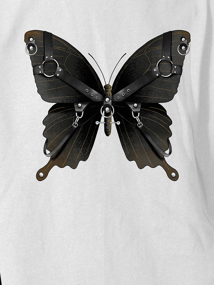 A close-up of a white printed t-shirt by useless treasures. Print of an illustrated black butterfly with leather gear and silver chains​ and piercings. 