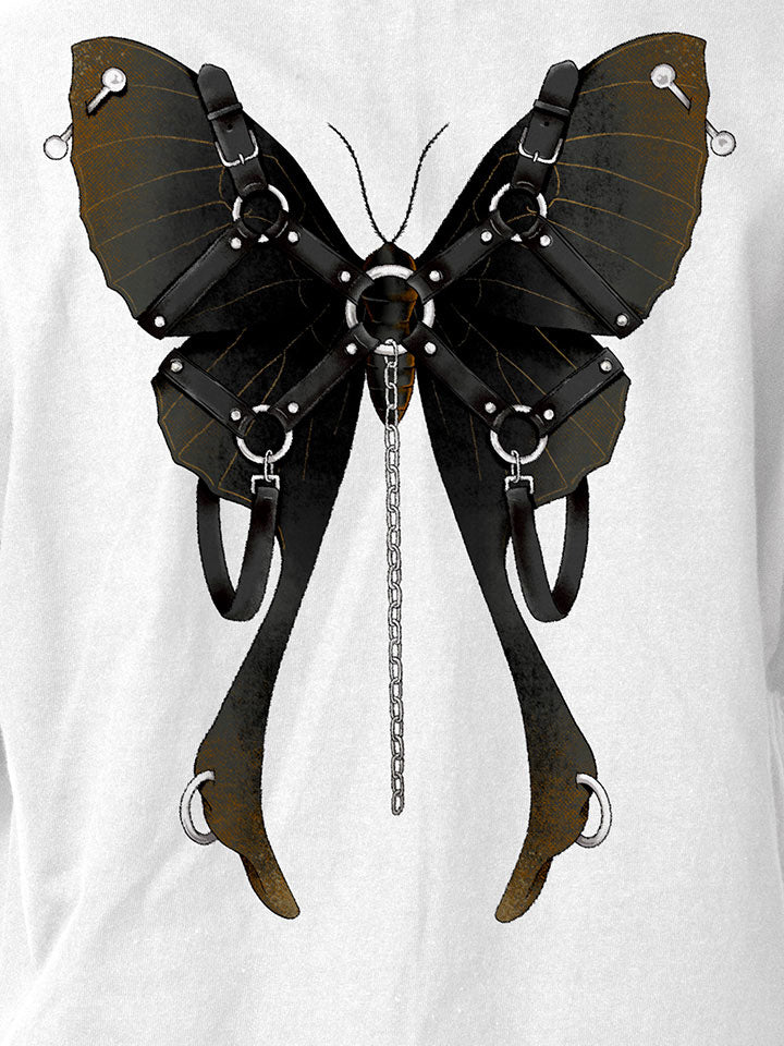 A close-up of a white printed t-shirt by useless treasures. Print of an illustrated black moth with leather gear and silver chains​ and piercings. 