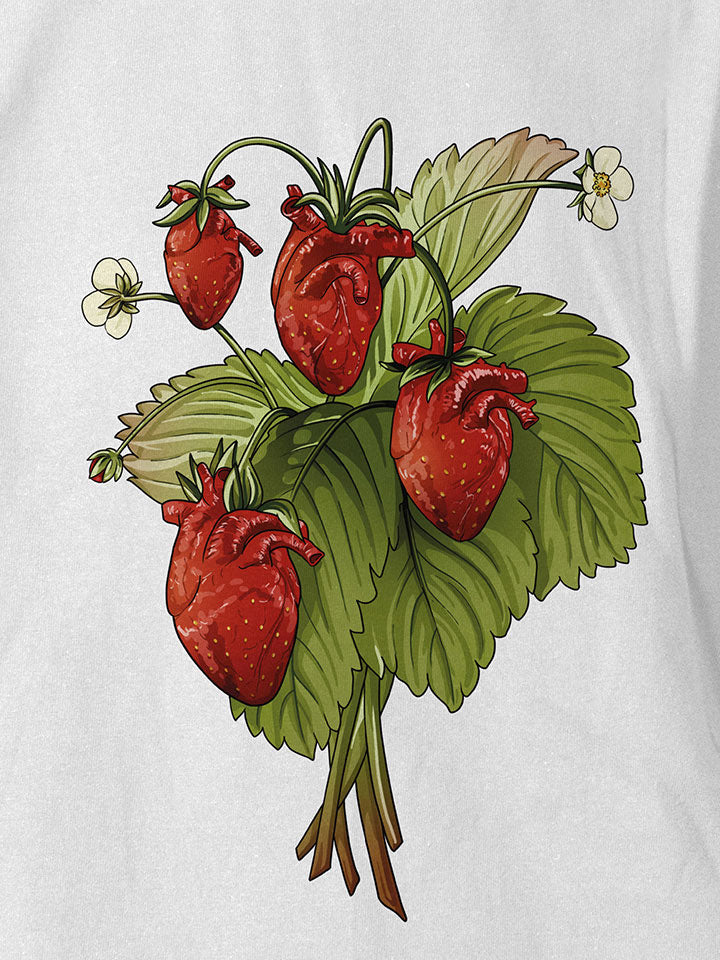  A close-up of a white printed t-shirt by useless treasures. Print of an illustration of a strawberry bouquet shaped like a human heart.  