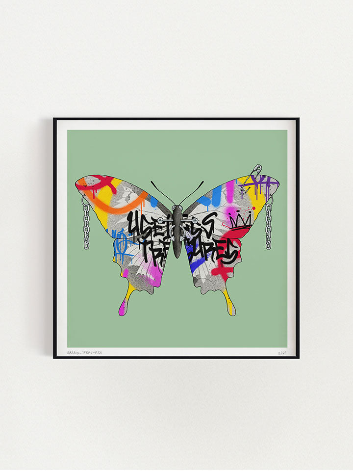 A Butterfly illustration with graffiti-colored wings on top of a green background, It was written on him also Useless Treasures, and his body and wings are with earrings and piercings - Art by useless treasures.