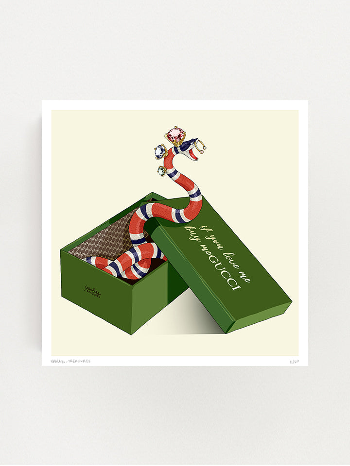 An illustration of the kingsnake with dimensions on him comes from a green Gucci shoebox written on it - if you like me, buy Gucci, on top of the beige background  - Art by useless treasures.