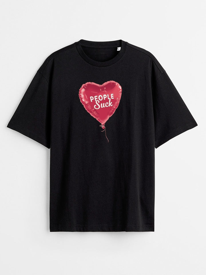 Black oversize printed T-shirt. Short sleeve Shirt with a print called "People Suck" of heart-shaped red, pink helium aluminum ballon with a text saying people suck. Illustration by useless treasures. Organic cotton, loose fit.